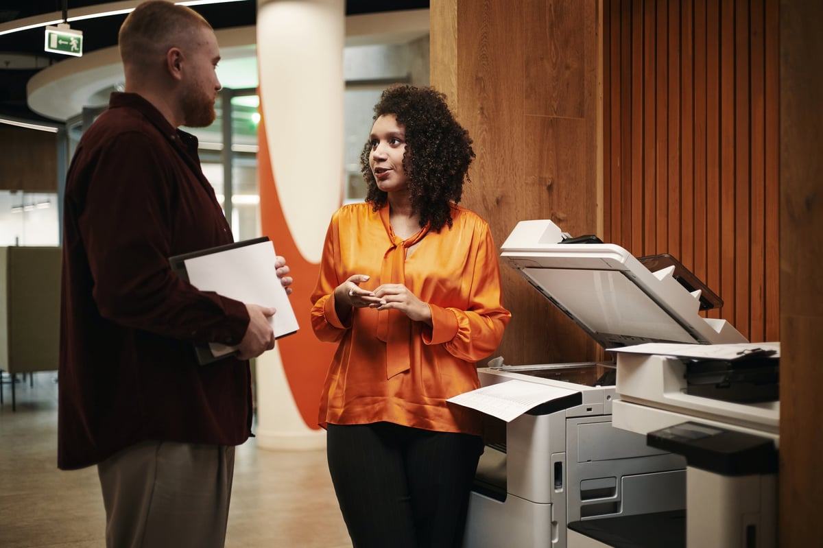 Office workers by printer