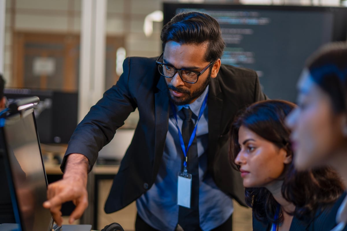 Group of programmers are coding at office. Business, Coding programs, AI applications, technology.